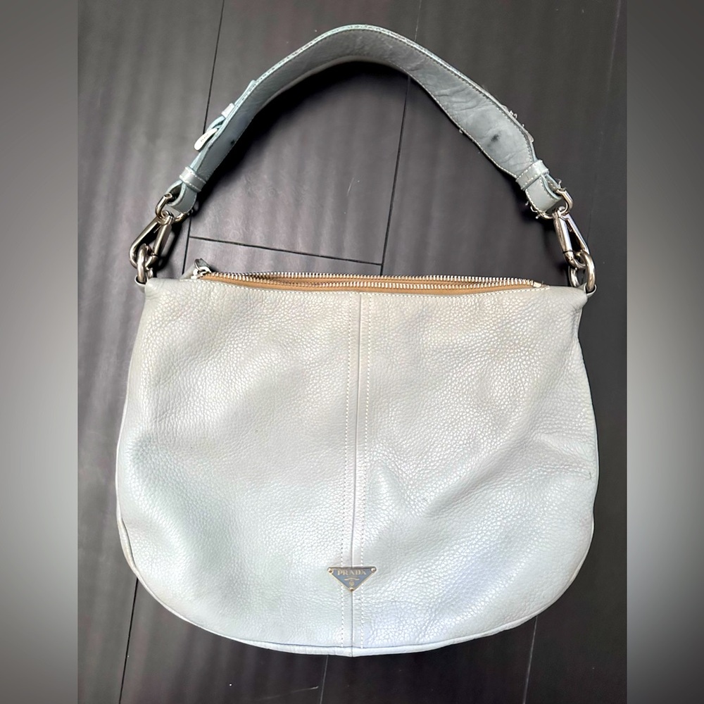 Prada light blue pebbled leather handbag